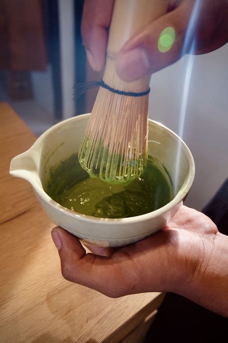 Whisking matcha at the Pererenan bar