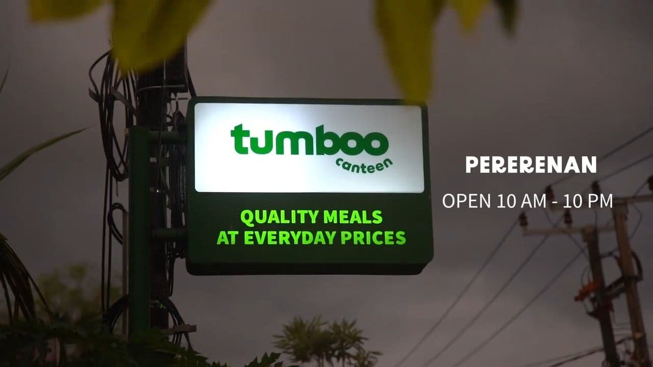 Tumboo Canteen sign lit at night